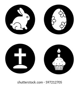 Easter icons set. Cross on hill, Easter bunny, egg with flowers pattern, cake and candle. Vector white silhouettes illustrations in black circles