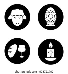 Easter icons set. Easter egg, lamb, candle with cross, bread and wine. Vector white silhouettes illustrations in black circles