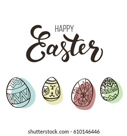 Easter lettering composition with pysanka eggs.