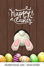 Easter motive, white bunny bottom and easter eggs on dark brown wooden background with text Happy Easter, vector illustration, eps 10 with transparency and gradient meshes