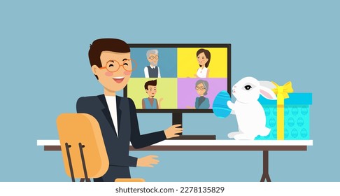 Easter in office, man sitting at table with white bunny, egg and gift. Video conference with people group on compuer, meeting online. Friends, colleagues talking on video celebrating Easter holiday