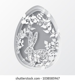 Easter paper art spring forest with  branches, leaves,  and easter ornate rabbit with floral motifs. Holiday origami concept. Paper carved egg