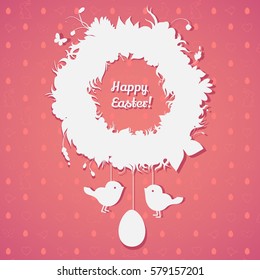 Easter paper decoration in the form of Easter wreath with eggs and birds