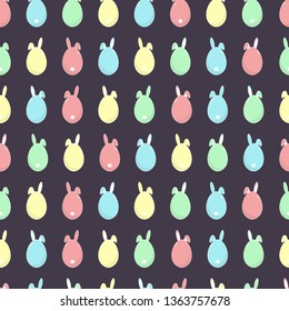 Easter pattern. Egg with bunny ears. Seamless pattern. Cute easter eggs on dark background. For wrapping paper, cover, fabric, textile. 