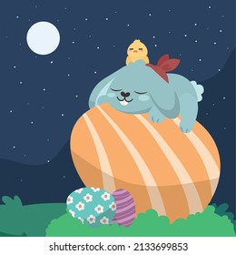 easter rabbit and big egg in the night
