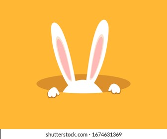 Easter rabbit, easter Bunny in the hole.Rabbit ears.Icon vector,isolated on orange background.