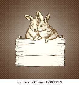 Easter rabbit couple on brown dots background