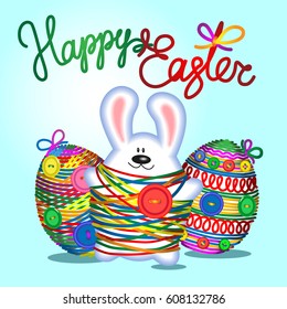 Easter rabbit on a turquoise background with eggs decorated with braid and buttons