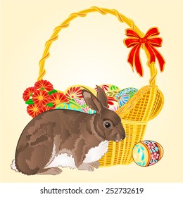 Easter  rabbit  and wicker with Easter eggs with flowers vector illustration