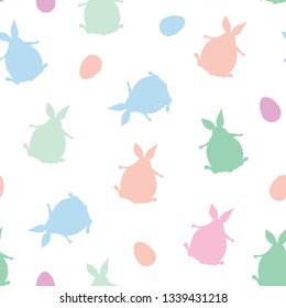 Easter rabbits and eggs. Vector seamless pattern.