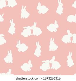 Siluetas de conejos de Pascua dibujadas a mano con el doodle vectorial patrón fluido