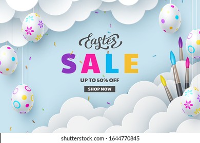 Easter Sale banner with painted hanging eggs, brushes, paper cut clouds and hand written lettering. Discount promotion seasonal design . Vector realistic.
