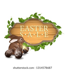 Easter sale, modern banner in form of wooden board with chocolate Easter Bunny