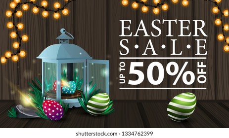 Easter sale, modern horizontal discount banner with wood texture, garland and antique lantern with Easter eggs