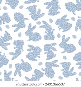 Easter seamless pattern of blue bunnies in floral pattern with Easter eggs