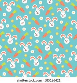 Easter seamless pattern with bunny, carrot and flowers on blue background. Perfect for wallpaper, wrapping paper, greeting cards, textile, spring decorations