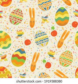 Easter seamless pattern in cartoon style. Holiday funny vector background with childish drawings of colored easter eggs, birds and rabbits on a light backdrop with multicolored flecks