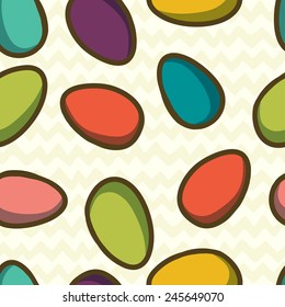 Easter seamless pattern with colorful doodle boiled eggs on doodle chevron backdrop. Hand drawn vector background.