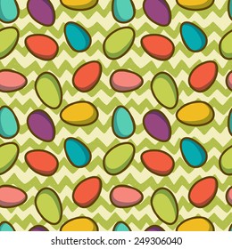 Easter seamless pattern with colorful doodle boiled eggs on hand drawn chevron background.