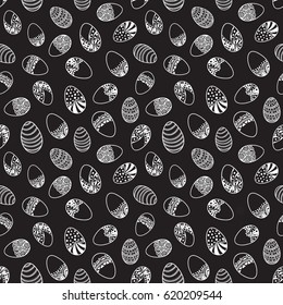 Easter seamless pattern with decorative zentangle eggs. Holiday monochrome background for greeting card, website, printing on fabric, gift wrap, postcard and wallpapers. Vector illustration.