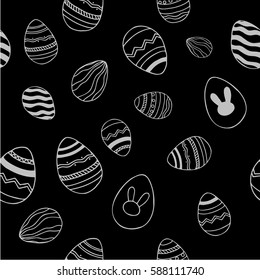 Easter seamless pattern. Hand drawn eggs silver on black background.
