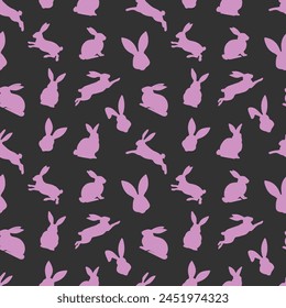 Easter seamless pattern of pink rabbit silhouettes in different actions. Festive Easter bunnies design. Isolated on black background. For Easter decoration, wrapping paper, greeting, textile, print