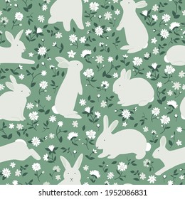 Easter seamless pattern. Rabbits with white flowers. Bunnies silhouettes vector illustration on a green background.