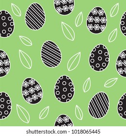 easter seamless pattern vector background, cute outline black and white painted easter eggs with spring leaves on green 