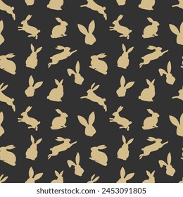 Easter seamless pattern of yellow rabbit silhouettes in different actions. Festive Easter bunnies design. Isolated on black background. For Easter decoration, wrapping paper, greeting, textile, print