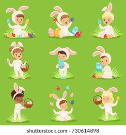 Easter set with eggs and children in bunny costumes