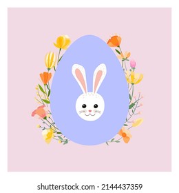 Easter spring greeting card. Easter egg on the background of spring grasses and flowers with the muzzle of a cute Easter bunny.