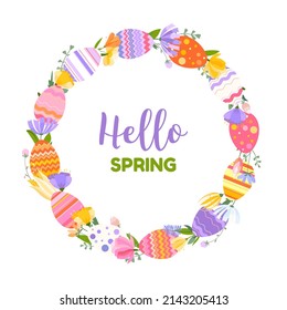 Easter spring greeting card. A wreath of spring flowers and herbs with bright Easter eggs. Inscription Hello Spring.