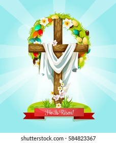 Easter Sunday Lenten Cross, He Is Risen greeting card. Wooden cross with blooming spring flowers and Easter egg wreath with narcissus and crocus flower. Easter holiday themes design