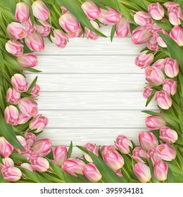 Easter time. Spring. Pink tulips on wooden background. EPS 10 vector file included