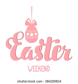 Easter weekend. Easter hand lettering. Easter egg with bow hanging on a string of beads.