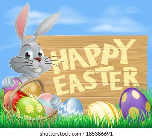 Easter wood sign in spring field reading Happy Easter with the Easter bunny and decorated Easter eggs