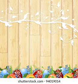 Easter wooden background with lace frame, eggs and forget-me-not flowers