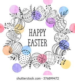 Easter wreath with easter eggs hand drawn black on white background. Decorative doodle frame from Easter eggs and floral elements. Easter eggs with ornaments in circle shape with watercolor dots.