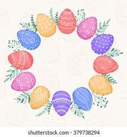 Easter wreath with easter eggs in sweet colors. Decorative frame from Easter eggs and floral elements. Easter eggs background with ornaments in circle shape. Easter postcard template with copy space.