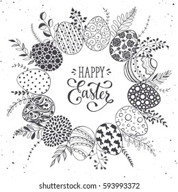 Easter wreath with hand drawn eggs and floral elements isolated on white background. Decorative frame from easter eggs with ornaments  in circle shape.