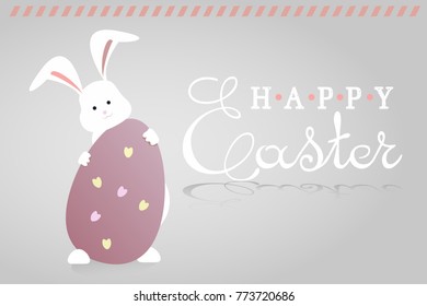 Easter,cute Bunny hiding behind an egg.
