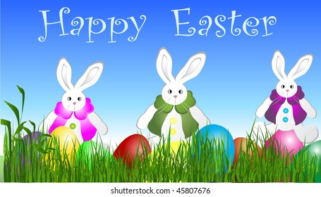 Eastern eggs  on the grass  with three rabbits