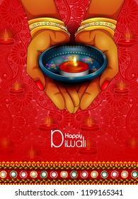 easy to edit vector illustration of lady holding decorated diya for Happy Diwali holiday background easy to edit vector illustration of lady holding decorated diya for Happy Diwali holiday background