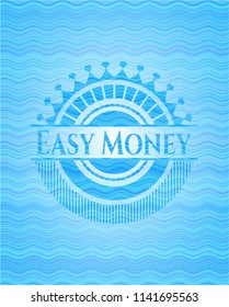 Easy Money water wave representation badge.