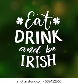 Eat, drink and be irish. Funny St. Partick's day saying at green blur background with four-leaf clover.