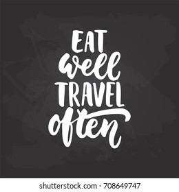 Eat well travel often - adventure hand drawn lettering quote in white color on the black chalkboard background. Fun ink calligraphy inscription