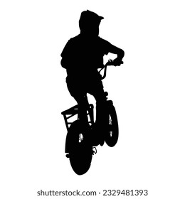 An e-bike and rider in silhouette