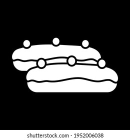 Eclairs dark mode glyph icon. French pastry with cream. Bakery products. Sweet treat. Confectionery and desserts. White silhouette symbol on black space. Vector isolated illustration