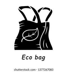 Eco bag glyph icon. Eco friendly, reusable, recycle textile. Organic, natural material. Eco friendly shopping handbag. Ecological fabric.Silhouette symbol. Negative space. Vector isolated illustration