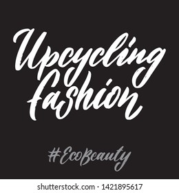 Eco beauty hand written lettering words: upcycling fashion. Ecology design on dark background